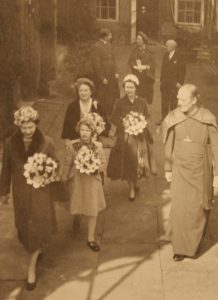 Her Majesty in 1959, accompanied by the Right Reverend Eric Hamilton, Dean of Windsor.